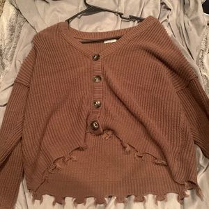 I’m selling a button up sweater/shirt that I do not like anymore